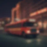 A sleek casino bus lined up in front of a vibrant Atlantic City casino.